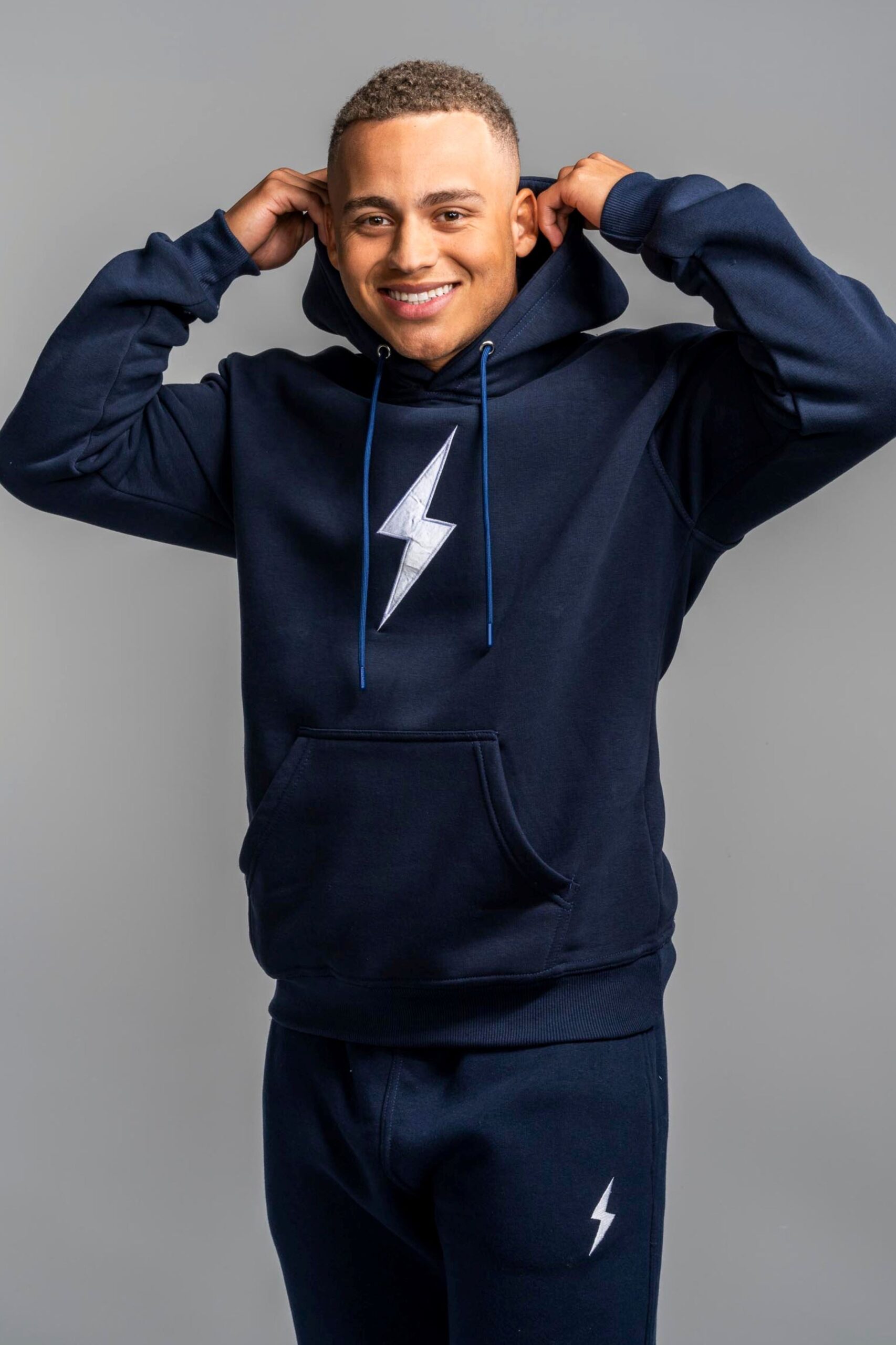 bruce-bolt-bolt-hoodie-navy-long-sleeve-hoodie-hamza-sarfaraz-international-594360.jpg