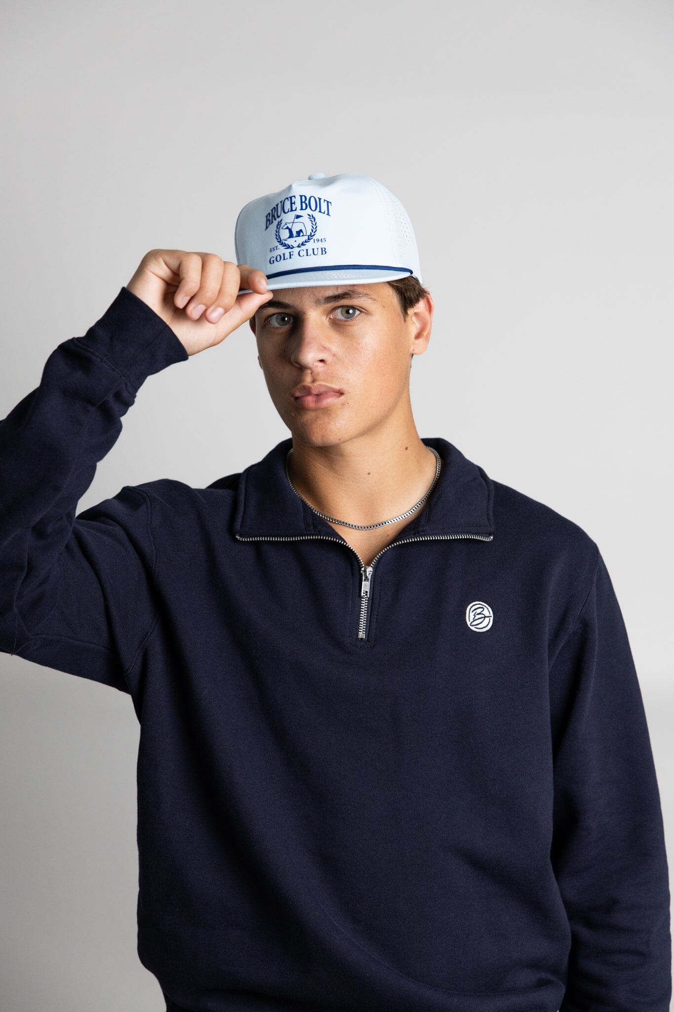 bruce-bolt-rope-snapback-with-bruce-bolt-golf-club-logo-baby-blue-5-panel-standard-rope-hat-popular-designs-434261.jpg
